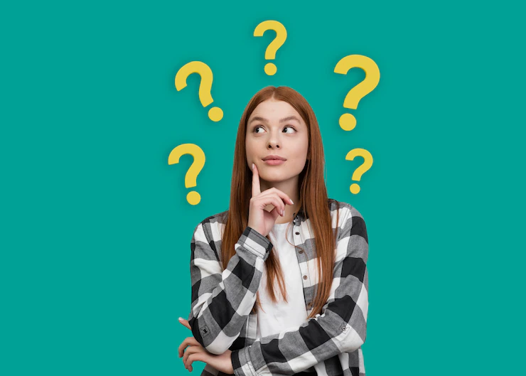 woman posing with question marks